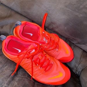 Orange Nike Women’s size 11